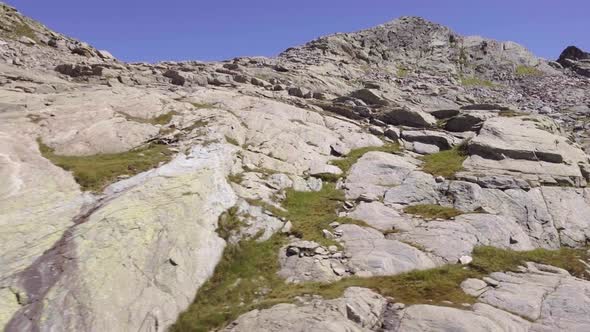 Italy Alps Mountains Aerial on Rocky Side in Summer Sunny Day alt