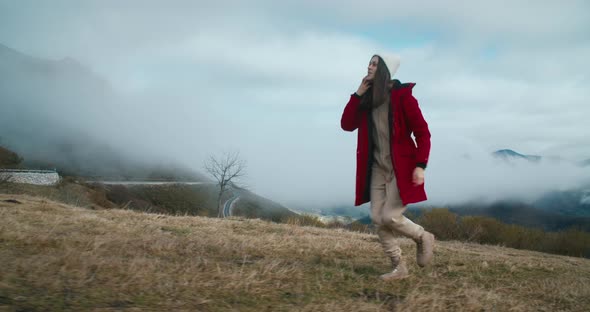Traveler Woman Walk Surrounded By Epic Natural Landscape on Springtime Journey alt