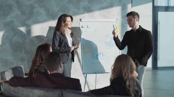 Diverse Group of Casual Looking Coworkers Having Small Cozy Conference Discussing Current Situation alt