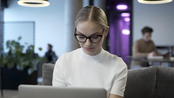 Face Of Young Business Lady Working With Laptop