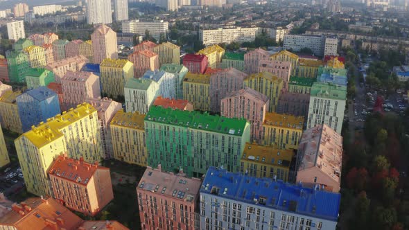 Top view of the colorful modern buildings, aerial footage from the drone alt