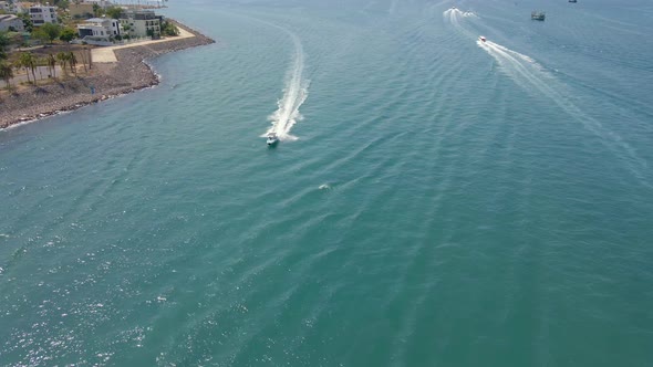 Aerial Slowmotion Shot of Big Fast Boats with Tourists Ride on the Sea. Concept of Sea Vacations