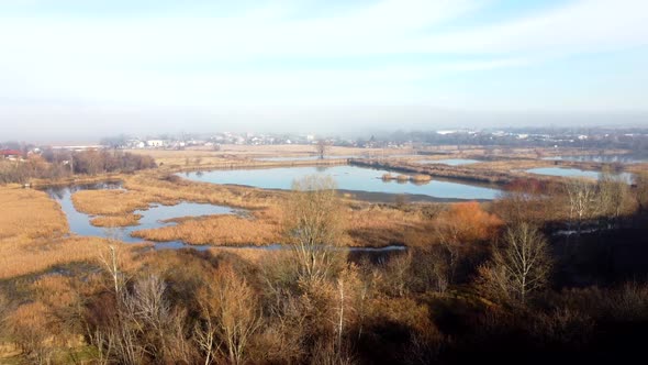 Aerial Drone View Flight Over Artificially Created Lakes for Breeding Fish alt
