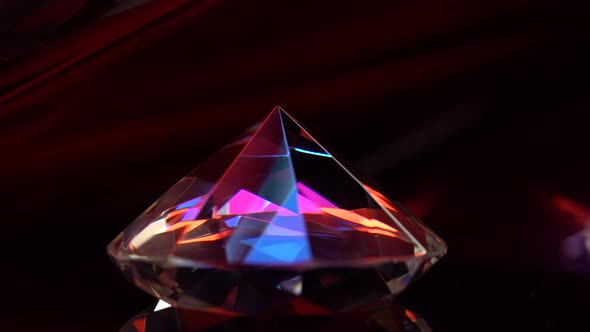 Diamond Rotating on a Surface and Flickering in Rays of Light alt