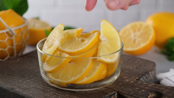 Juicy sliced lemon. Frozen lemon slices