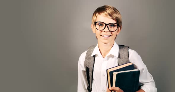 Boy with English Book Isolated on Background