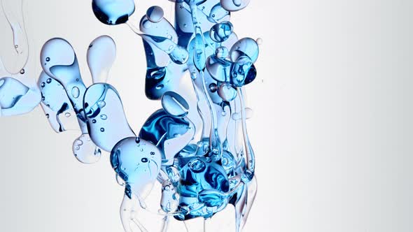 transparent cosmetic blue oil bubbles and shapes on white background