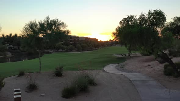 Golf Course Through The Trees At Sunset 4 K