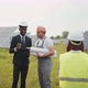 Multiracial People Having Working Discussion About Green Energy While Standing - VideoHive Item for Sale
