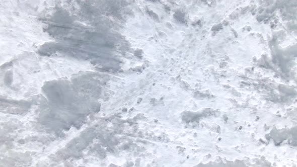 Top View of the Icy Sea. Ice Formations From the Air. alt