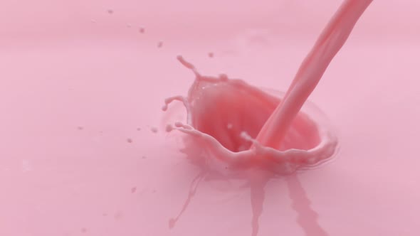 Strawberry milk pouring and splashing in slow motion; shot on Phantom Flex 4K at 1000 fps alt