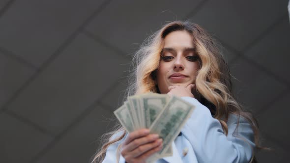 Bottom View Successful Rich Girl Business Woman Buyer Holding Banknotes Dollars in Hands Counting alt