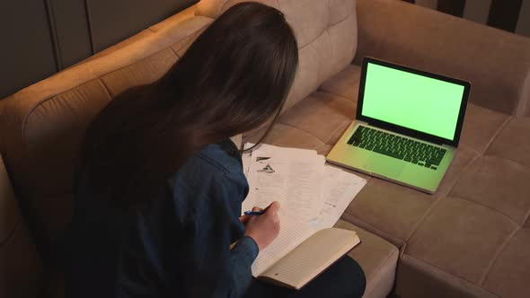Portrait of Woman Calling Video on Laptop Green Screen Chromakey