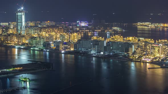 Aerial View of Palm Jumeirah Island Night Timelapse alt