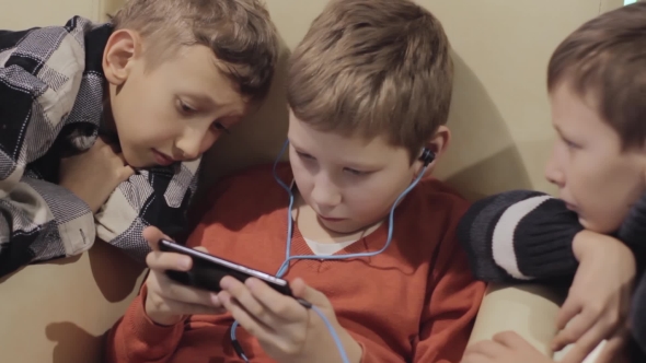 Boy's Friendship, Technology and Concept - Male Friends with Smartphone