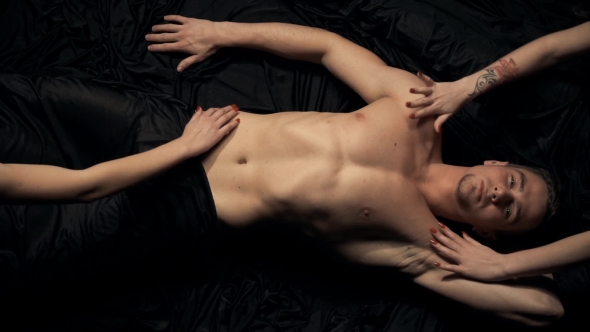 Female Hands on a Sexy Male Body