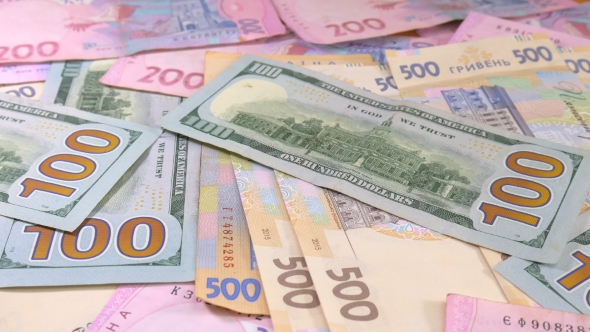 Slider Money on the Table Denominations. Dollar and Hryvnia