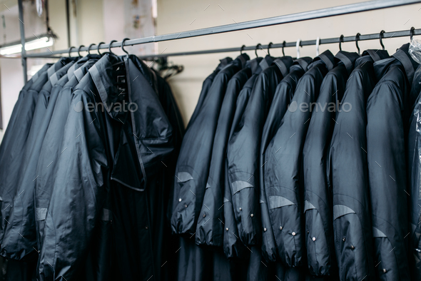 Row of jackets on hangers, clothing store, fabric - Stock Photo - Images