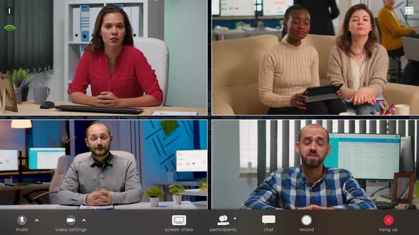 Employee Talking on Video Call with Diverse Colleagues alt
