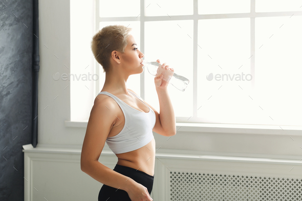 Image result for lady taking water in the gym