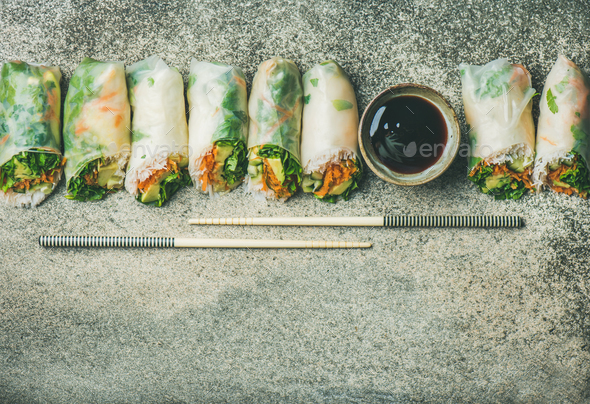 Flat-lay of vegan spring or summer rice paper rolls - Stock Photo - Images