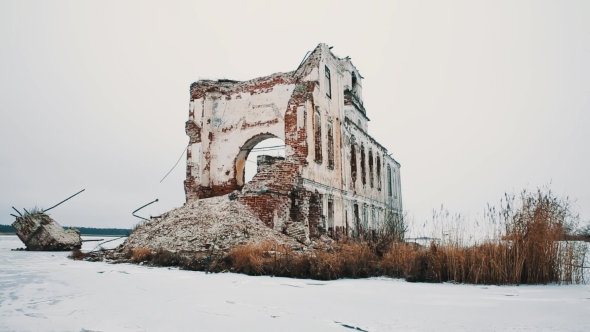 Destroyed Orthodoxal Church in Middle of Frozen Lake Covered in Snow