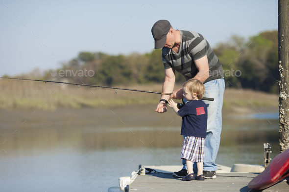 father and son fishing - Stock Photo - Images