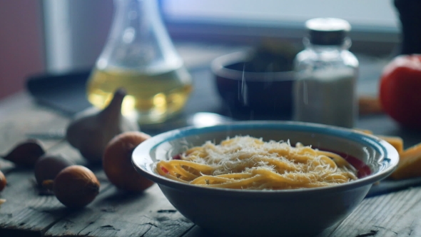 Adding Cheese in Carbonara Spaghetti