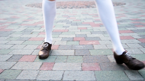 Dancer's Legs , Loop Girl Dancing Solo Jazz Swing Dance Funny Dance on the City's Square Pavement