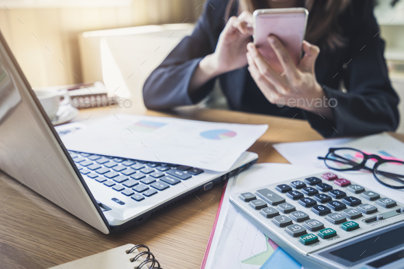 Businessman working on Desk office business financial accounting calculate  Stock Photo by kitzstocker