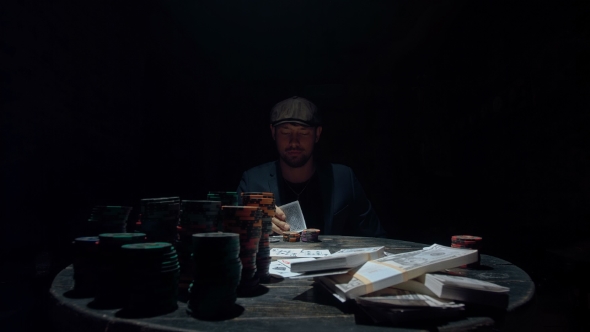 A Poker Player Loses the Game. Aggressively Attacks Another Player. alt