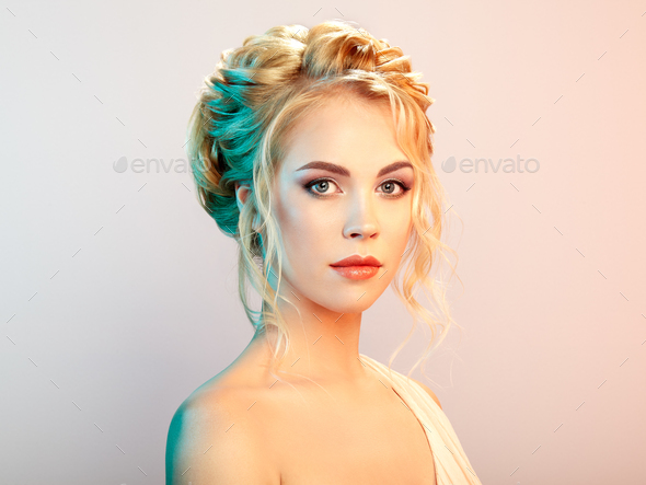 Blonde girl with long and shiny curly hair - Stock Photo - Images