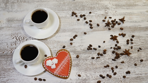 Love Relations Concept Coffee in White Cups Home Made Heart Shaped Ginger Biscuit on Wooden alt