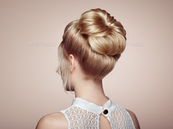 Blonde girl with elegant and shiny hairstyle - Stock Photo - Images