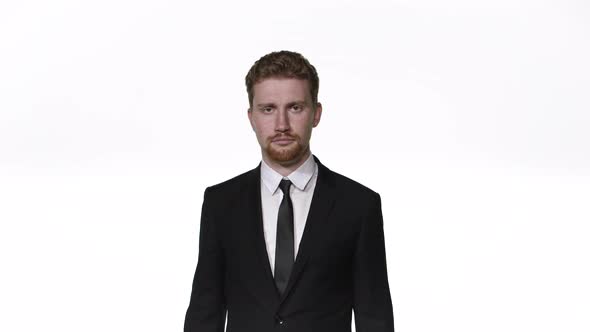 Businessman Listens To Serious Information and Approves It