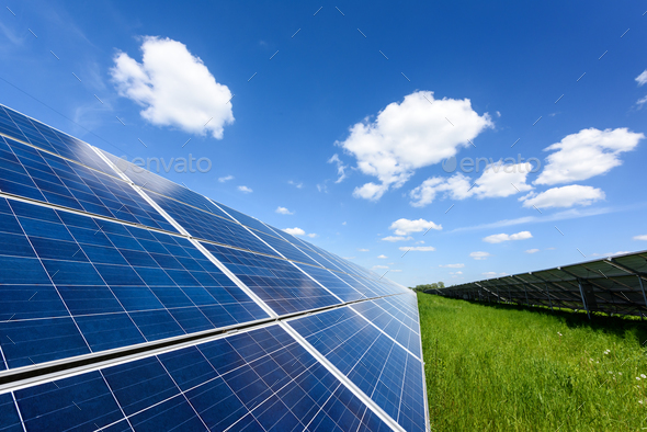 Solar panel on blue sky background Stock Photo by ivankmit | PhotoDune