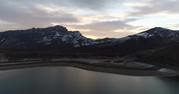 Aerial Shot of the Pre-dawn Glow on the Mountain Lake