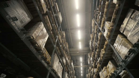 Camera Moving Between Palettes with Ordered Goods and Materials at Warehouse