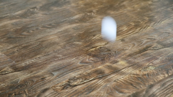 Falling and Breaking an Egg on Laminate