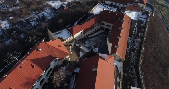 Beautiful Panoramic Aerial View To Palanok Castle at Sunset and the City of Mukachevo alt