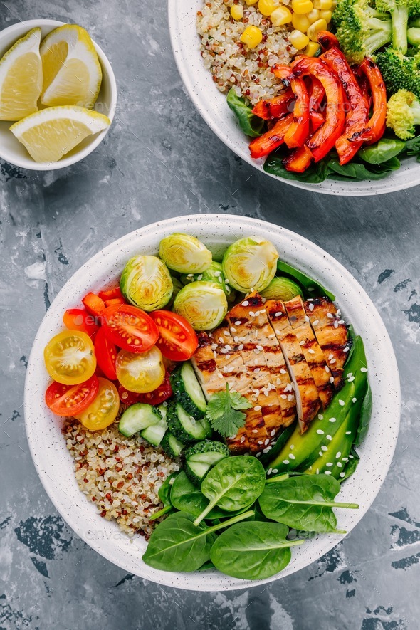 Buddha bowl with grilled chicken, quinoa, spinach, avocado, brussels ...