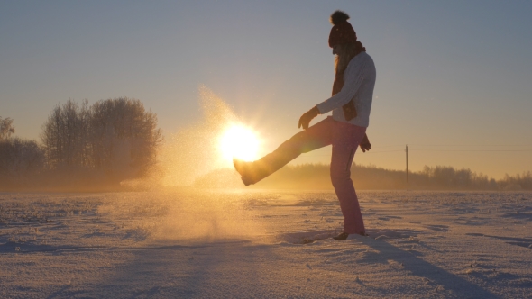 Woman In Winter Field At Sunset Kicked Snow And Glittering Snowflakes And Frost alt