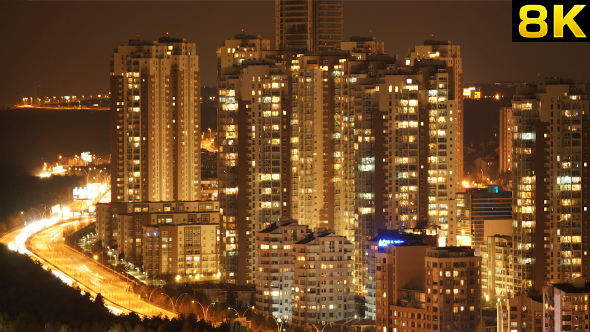 Crowded City Lights of the Houses and Traffic alt