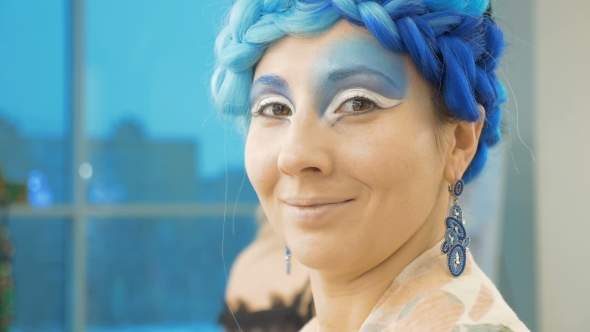 Portrait of a Beautiful Young Woman in a Magical Image. She Participates in the Photo Shoot. alt