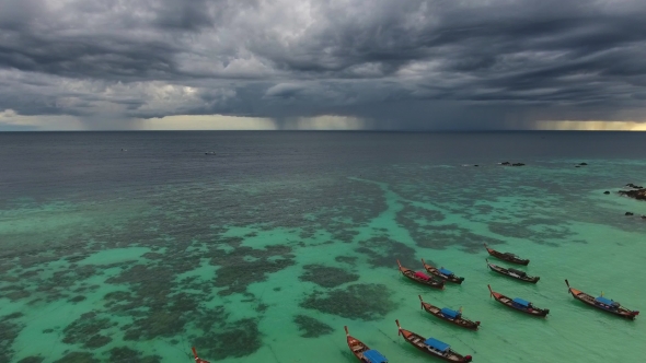 Aerial View on Boats at Beach and Thunderstorm alt