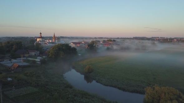 Aerial View of the Fog Over the River at Dawn