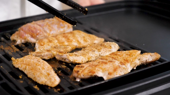 Turning a Piece of Smoking Steaming Hot Piece of Meat alt