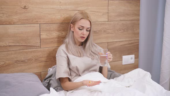 Cute Blond Woman Holding Pills Time to Take Medications Cure for Headache