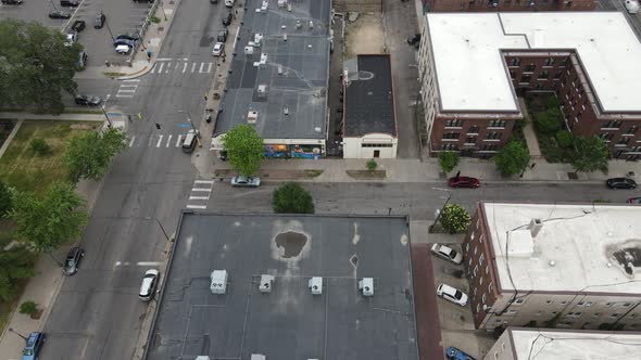 Birds eye view of older section of downtown Minneapolis. Buildings in various states of repair.