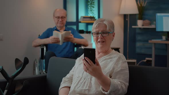 Cheerful Woman Enjoying Remote Conversation on Video Call alt